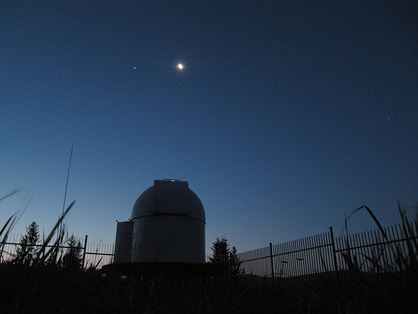 Photo: Moon and Jupiter over the small dome